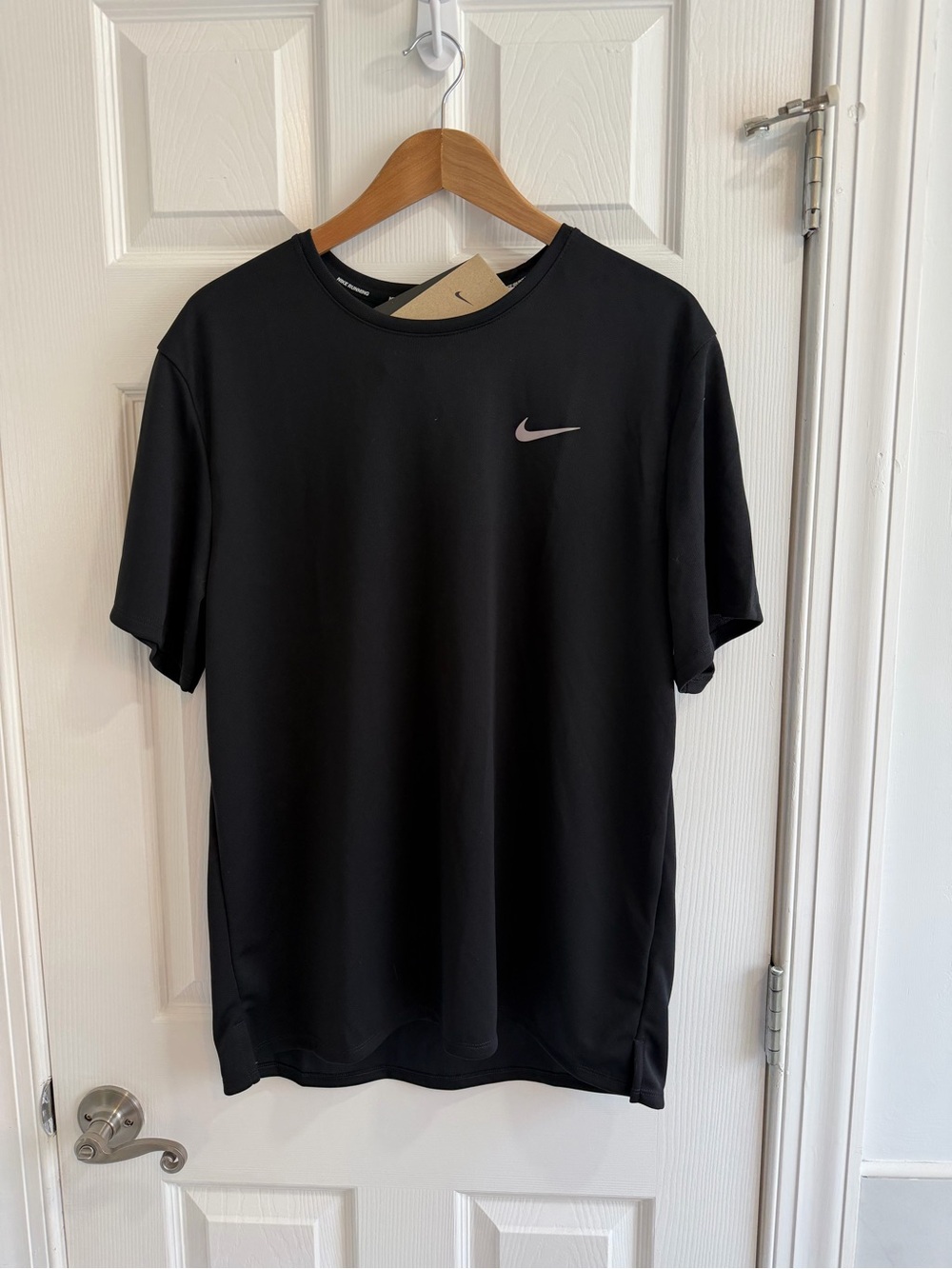 Nike Black Short Sleeve Dri-FIT Tee with Reflective Swoosh running with upf 40+